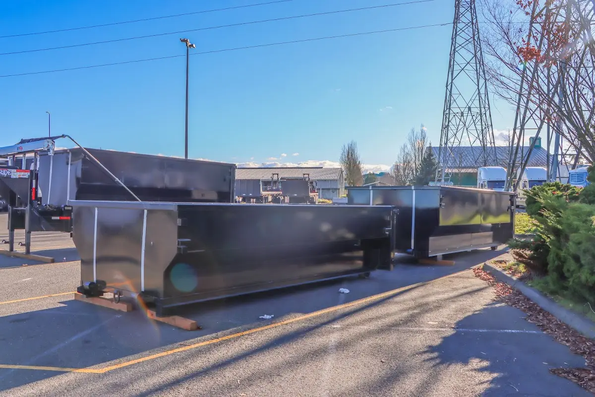 Roll-off dumpster ready for waste disposal at job site for Yard Waste Dumpster Rental in Georgetown